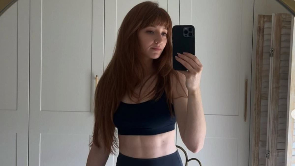 Nicola Roberts shows off her toned abs in sports bra