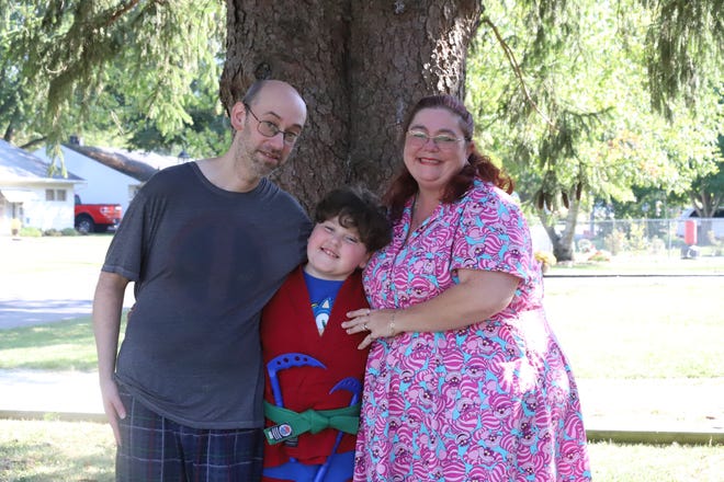 James and Saretta Holdcroft with their son Griffin, who found an outlet in martial arts to help him with his developmental disabilities.